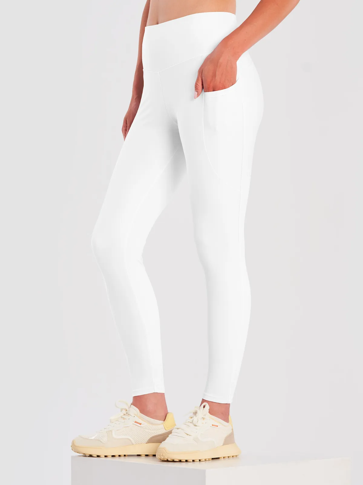 A model wearing the All-over Printed Leggings With Pockets