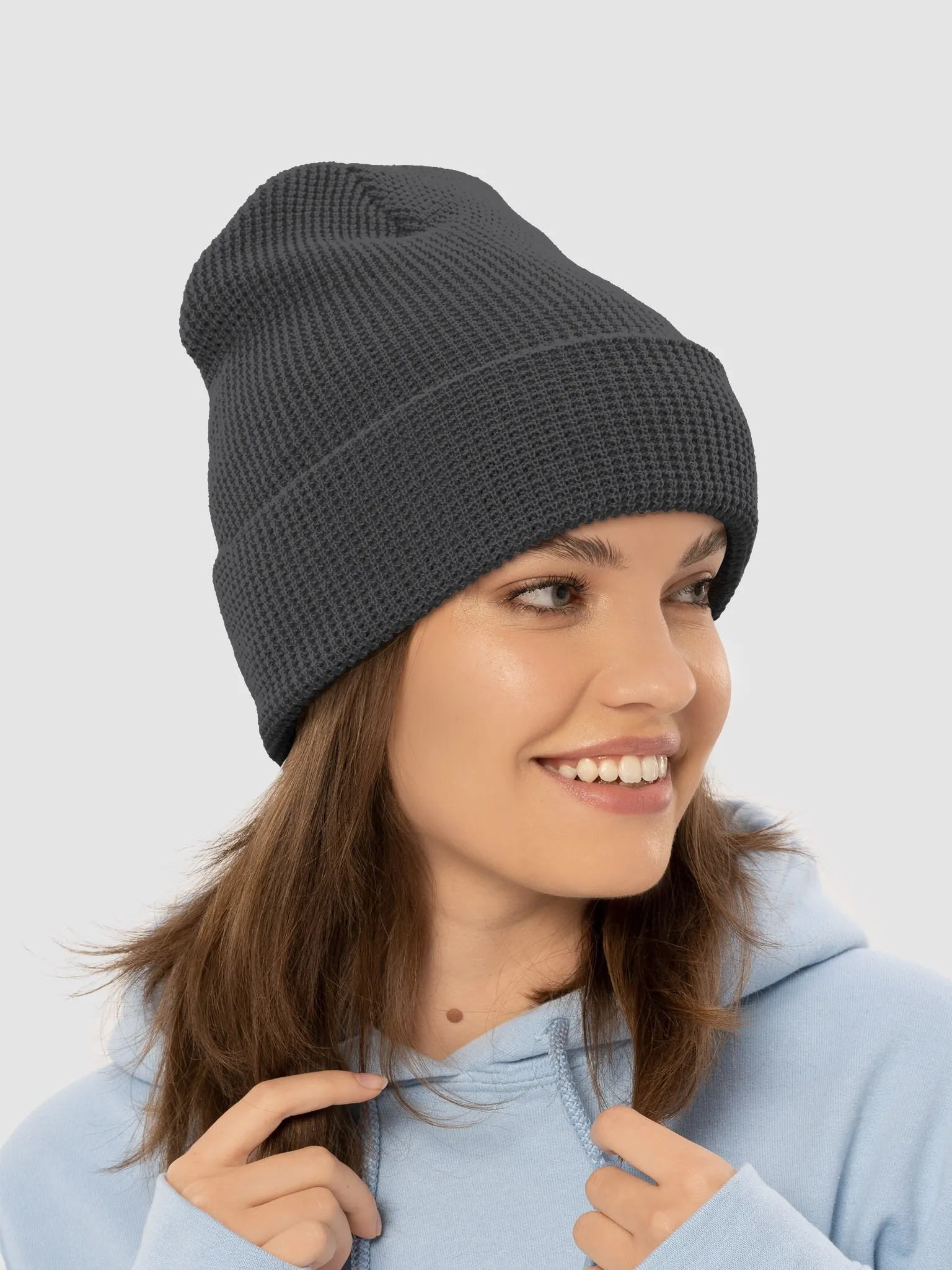 An image of a model in a hat