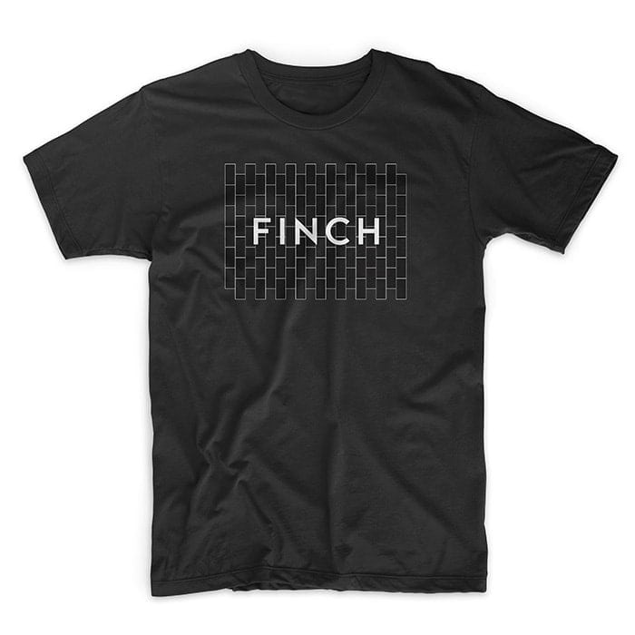 Image of a black t-shirt with the “Finch” design printed on it.